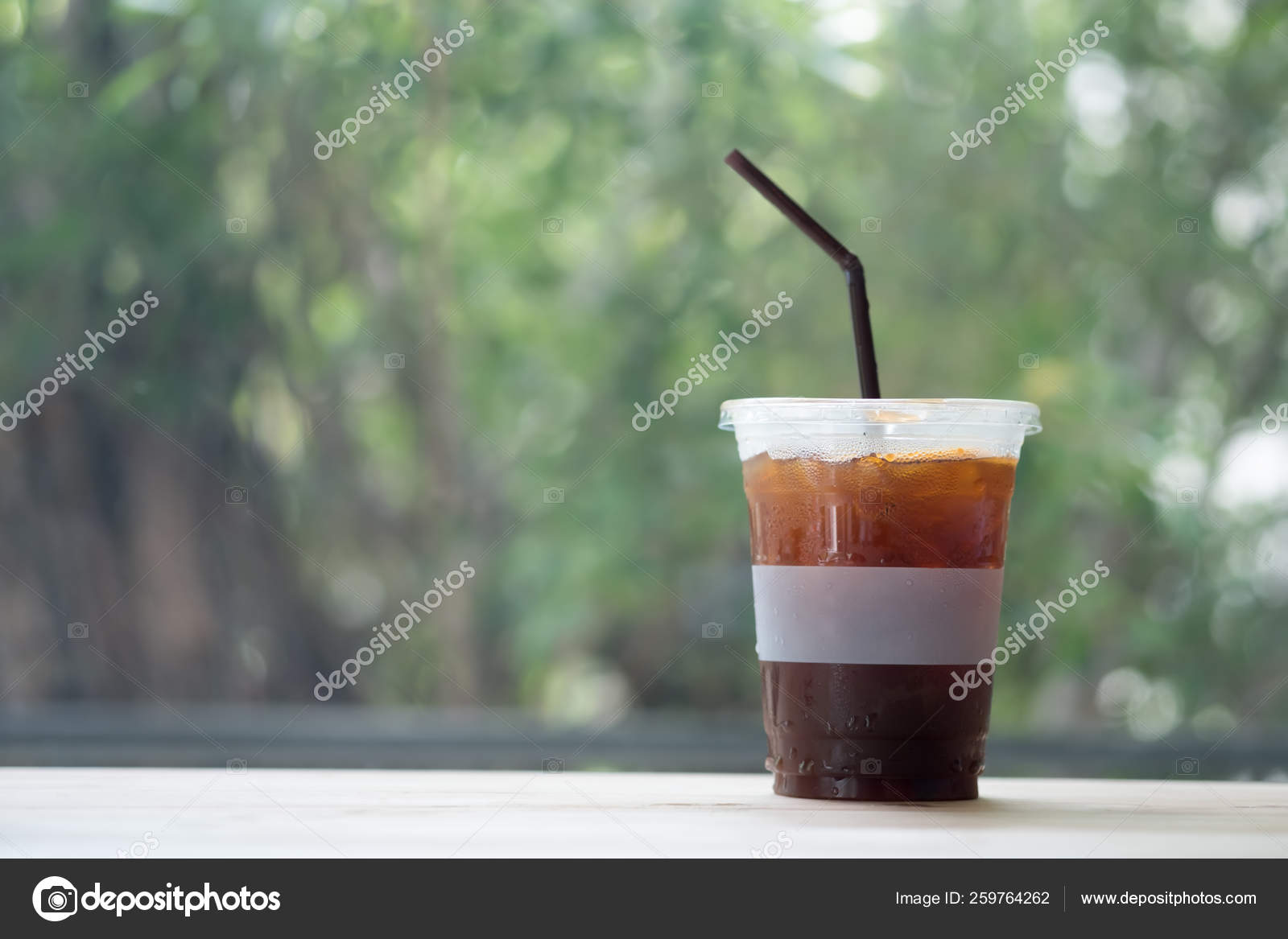 Iced Americano Coffee On Wood Table Stock Photo Image By C Dontree Iced Americano Coffee On Wood Table Stock Photo Image By C Dontree