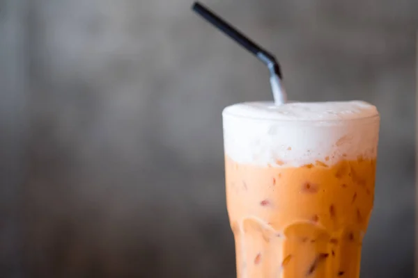 Thai milk ice tea and straw — Stock Photo, Image