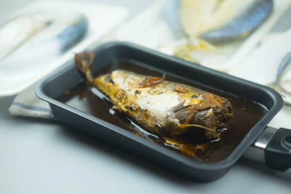 Boiled mackerel fish in soy sauce