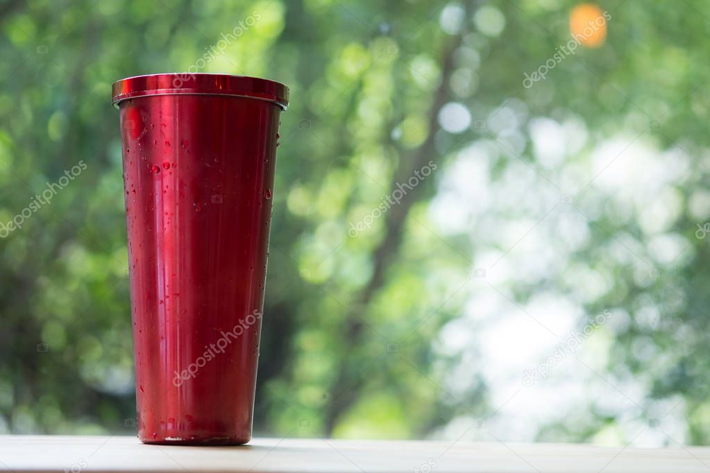 Red stainless steel tumbler for keeping of the drink cold or hot