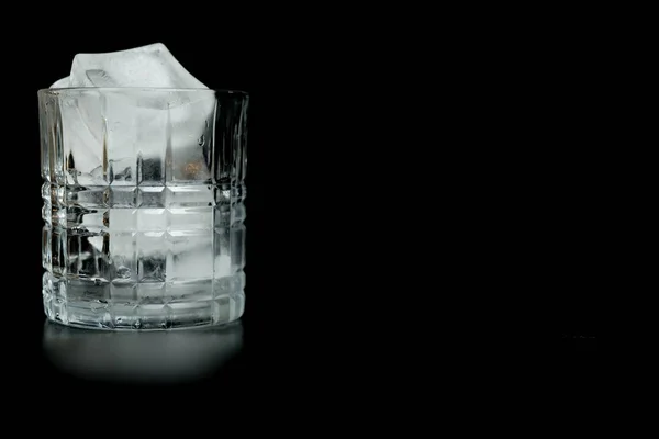 Ice cubes in empty glass — Stock Photo, Image