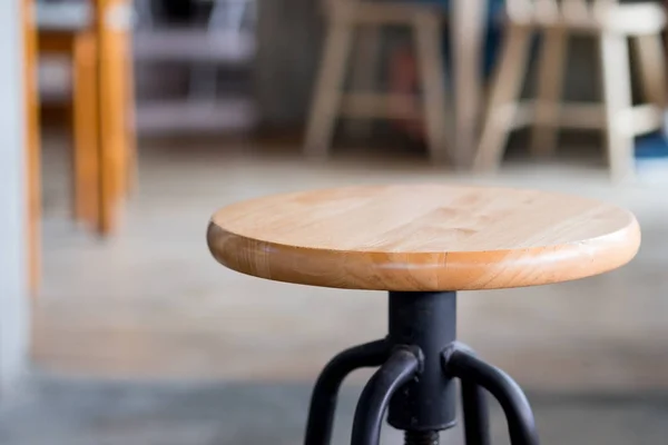 Wood stool chair in cafe coffee shop