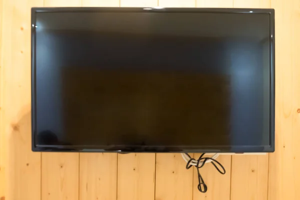 Moderno televisor led colgado en la pared — Foto de Stock