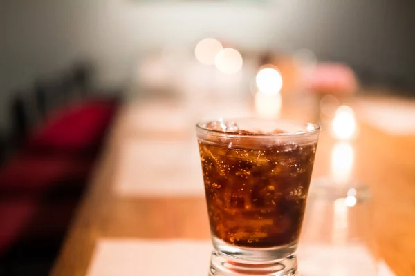 Glass of soft drinks placed on the table — Stock Photo, Image