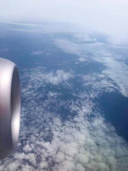 The turbine of the airplane above the clouds close up — Stock Photo, Image