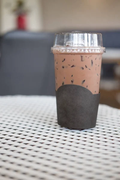 Iced coffee mocha in takeaway cup