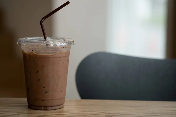 Iced coffee mocha in takeaway cup