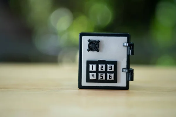 Miniature safe deposit with a code lock