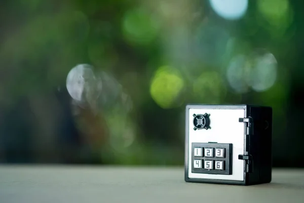 Miniature safe deposit with a code lock