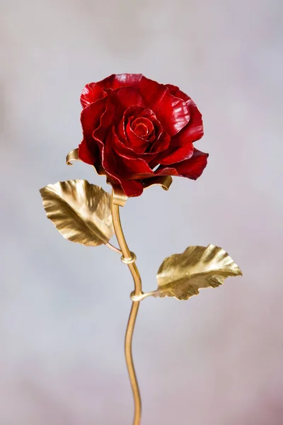 metal red rose as symbol of eternal love