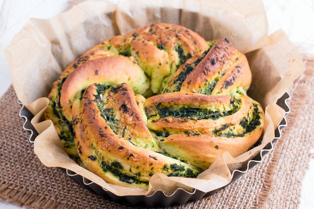 Yeast bread with garlic and herbs on the table