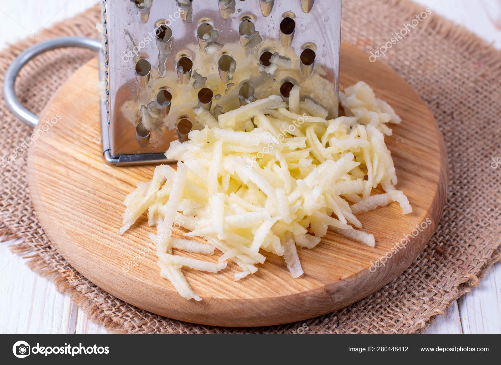 Grater And Fresh Ripe Apple On Wooden Board, Closeup Stock Photo, Picture  and Royalty Free Image. Image 175616454.