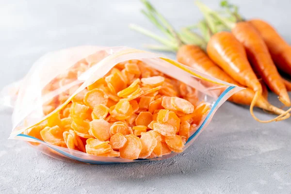 Frozen Slices Carrots Plastic Bags Light Background Frozen Vegetables — Stock Photo, Image