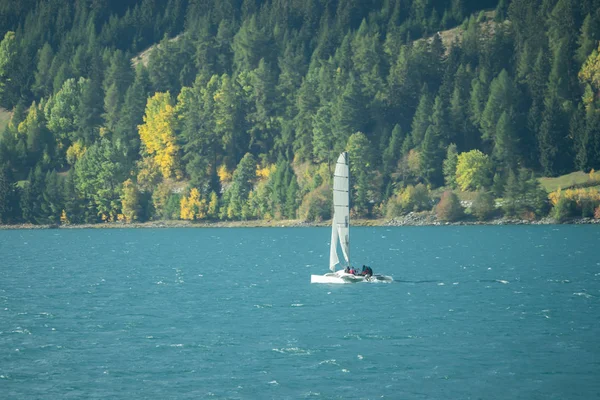 A sailboat on the lake on a sunny day