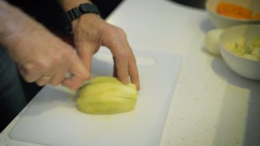 the man at the age of preparing a meal in their