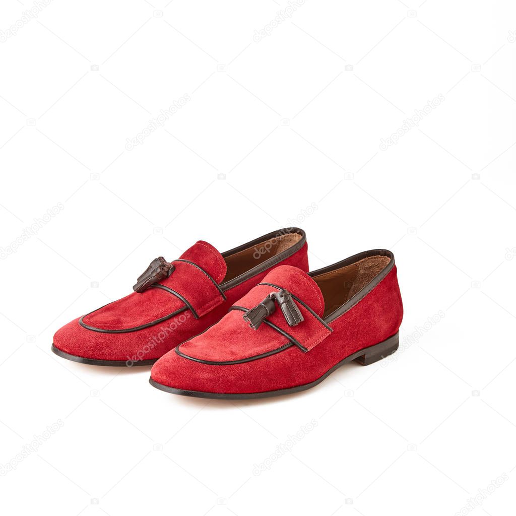 Men's red suede loafers shoes. Studio shot, white background