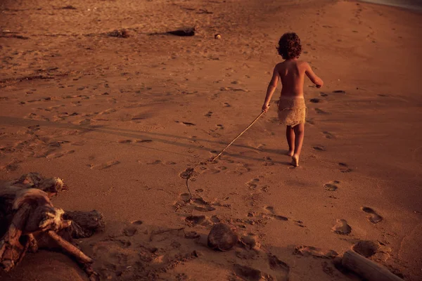 Mowgli Boy Curly Hair Walking Beach Stick Hand Shot — Stock Photo, Image