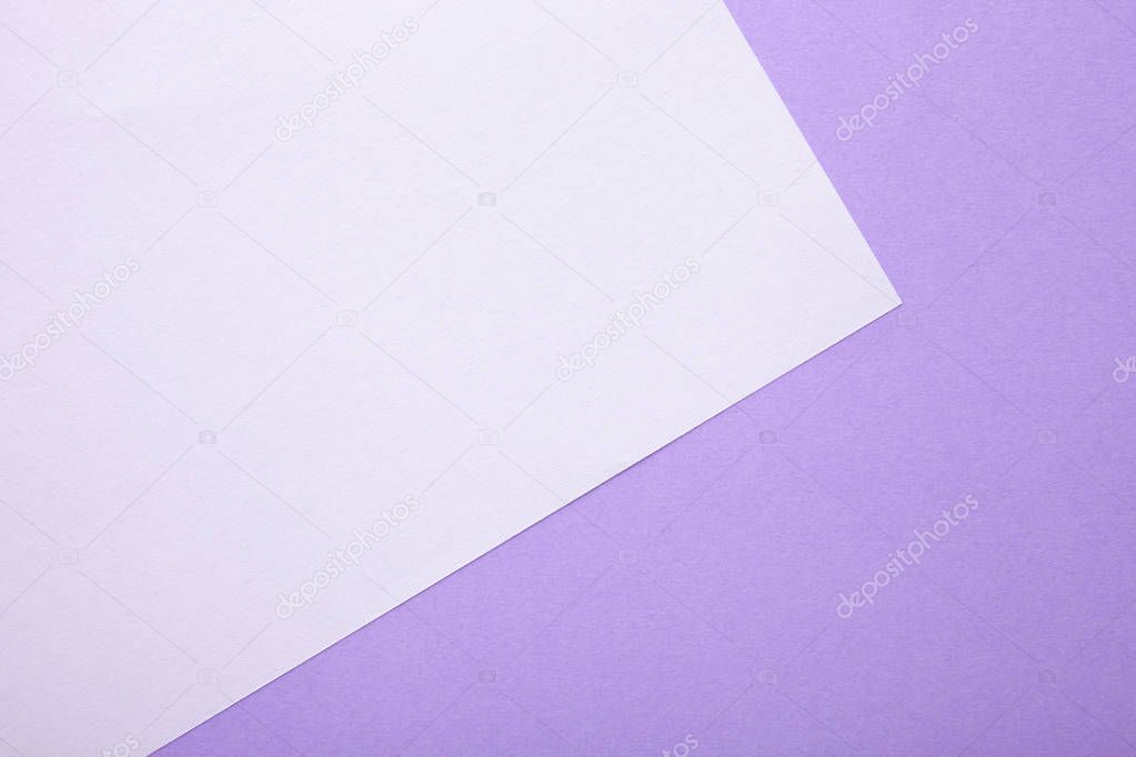 White and purple pastel texture as background. Top view