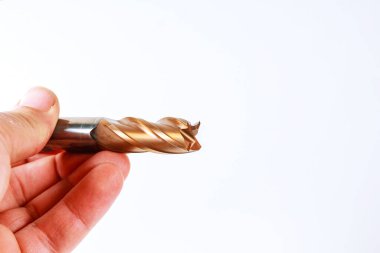 CNC makineleri için değirmen kesicisi beyaz arka planda izole.