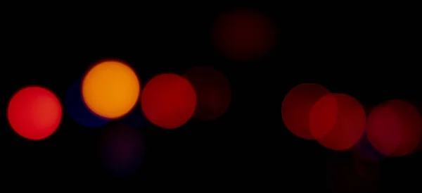 Siyah Arkaplanda Turuncu Kırmızı Işıklar Yanıp Sönüyor — Stok fotoğraf