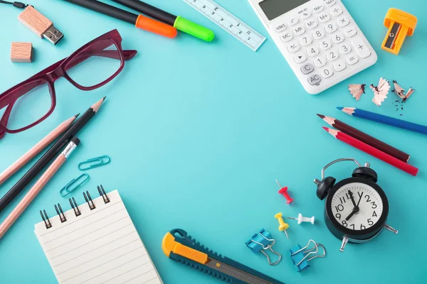 School stationery on blue background — Stock Photo, Image