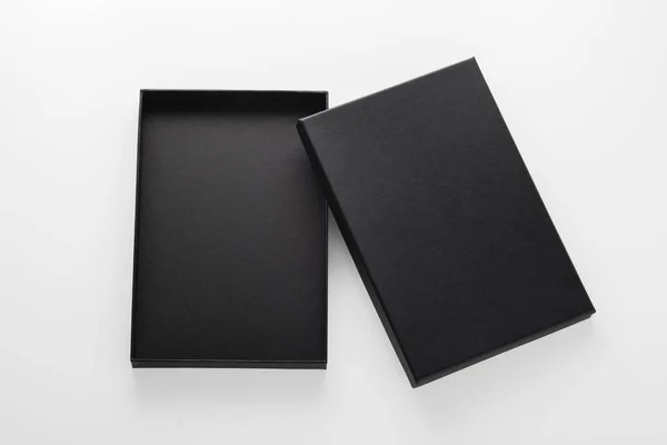 Kinyitott fekete doboz, termék csomagoló — Stock Fotó