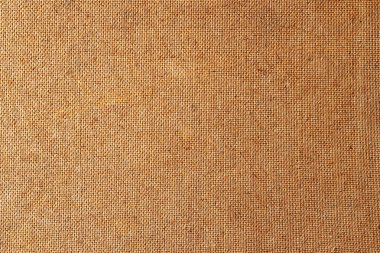 Arka plandaki hardboard resmi. Fiberboard 'un arkaplan resimleri. Fibröz arka doku. Fiber yüzey dokusuna yakın çekim.