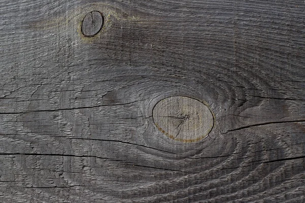 Παλιά υφή ξύλου. Μια σανίδα από παλιό φυσικό ξύλο με κόμπους, ρωγμές και γρατσουνιές. Ξύλινη υφή με κόμπο γκρο πλαν, κενό αντίγραφο χώρου φόντου, για σχεδιασμό ιστοσελίδων. — Φωτογραφία Αρχείου