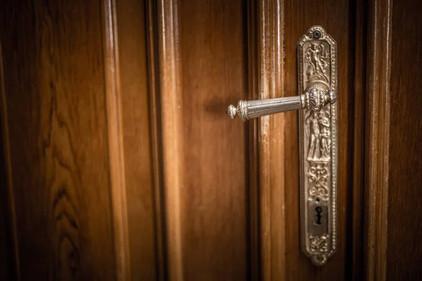 historic door handle in a villa door