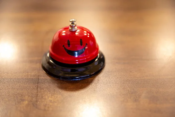 Service Red Bell Wooden Table — Stock Photo, Image