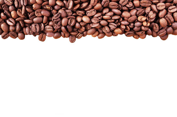 Coffee beans at border of image with copy space for text. Coffee
