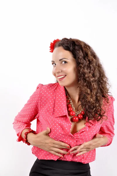 Young girl with a red necklace, bracelet, hairpin on a white bac — ストック写真