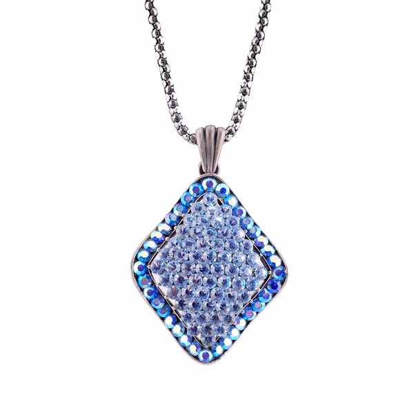 Pendentif bleu avec cristaux sur fond blanc — Photo