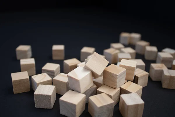 Wooden small blocks on the background. Background for desktop. Office style.Agile and scrum. Team players.Social life.In the office.Equality and diversity