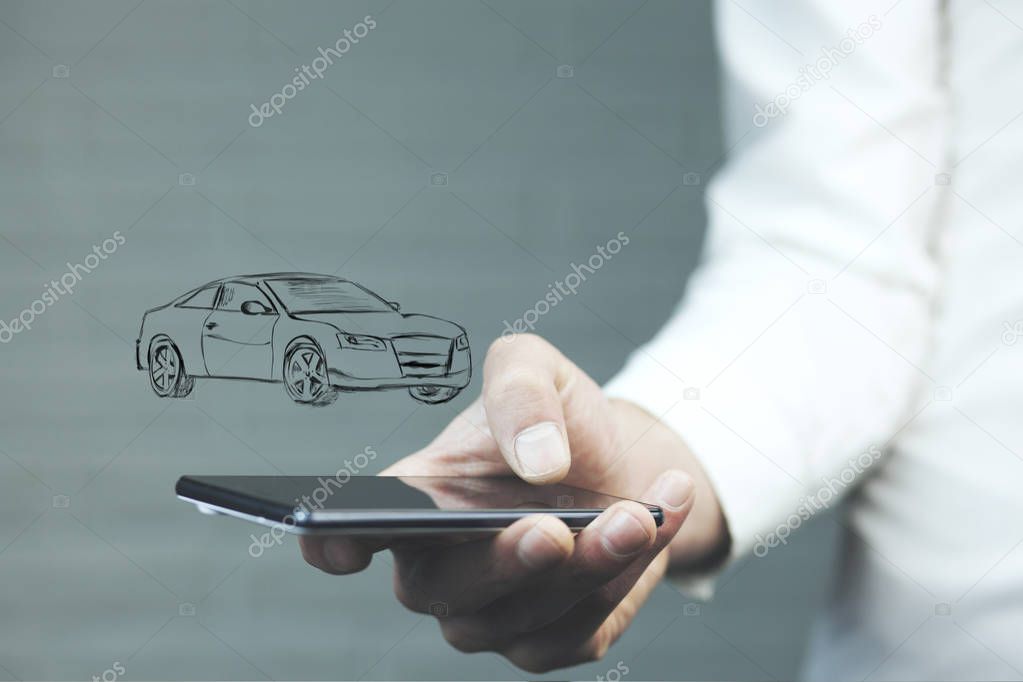 business man's  hand with  smartphone with car icon 