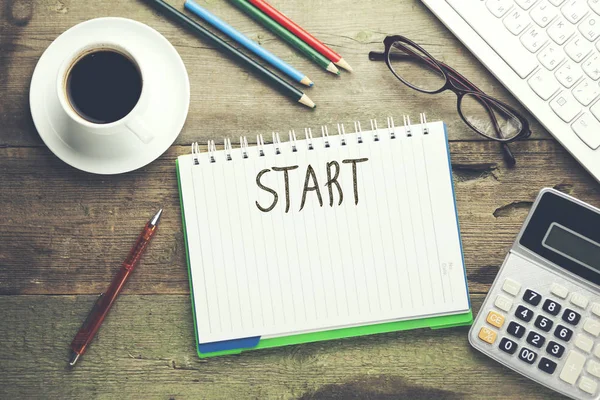 Masa üstünde defter başlangıç metni