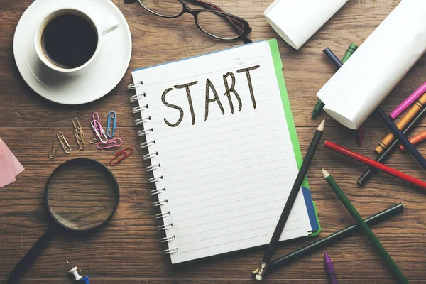 Masa üstünde defter başlangıç metni