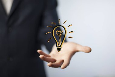 iş elini ampul simgesi olan 