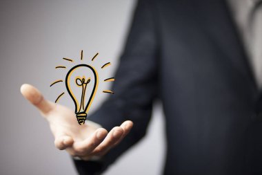 iş elini ampul simgesi olan 