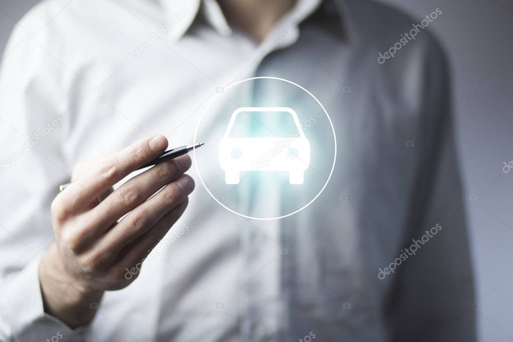 man hand pen with car in  scree