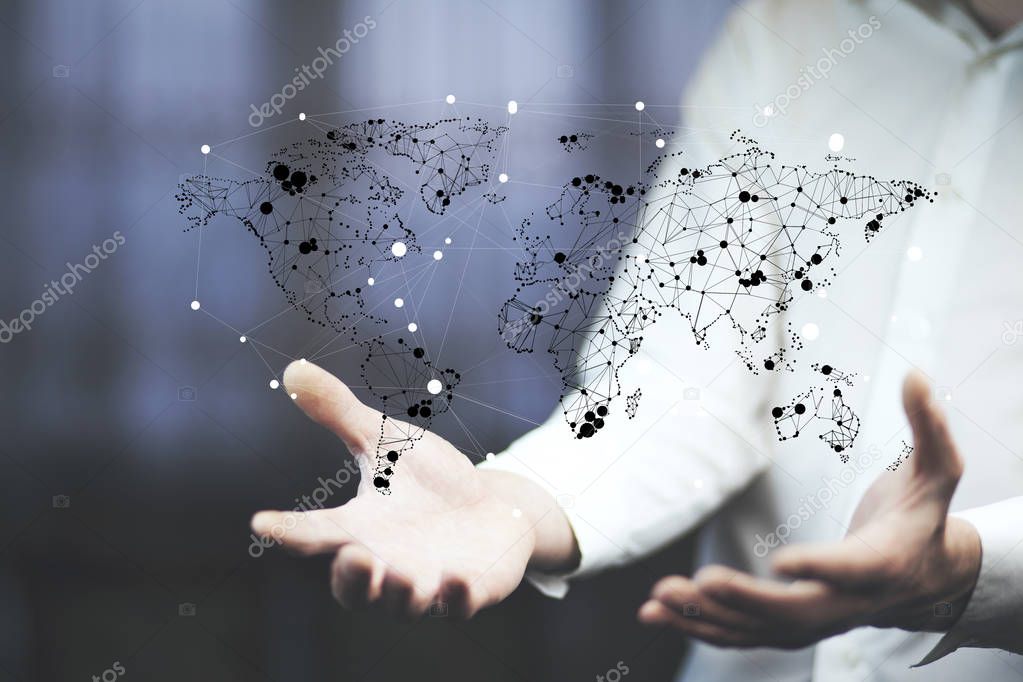 businessman with  world map over hands