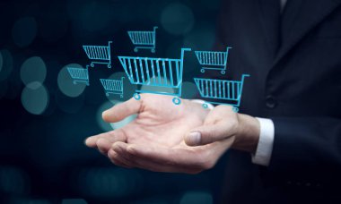 Alışveriş sepetleri simgeleri ile iş adamı 