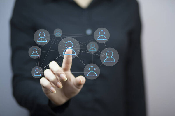 young businessman touching  social network icon 