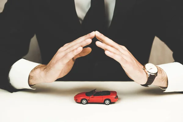 Man Hands Red Car Model Office Table — Stock Photo, Image