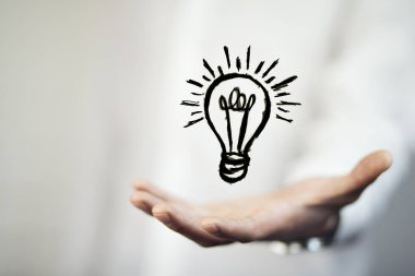 ampul simgesi ile iş adamı. fikir kavramı