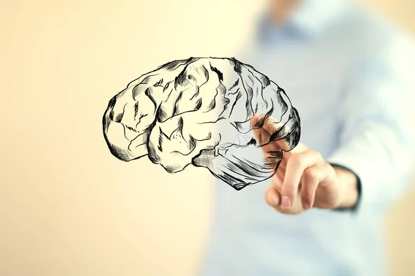 Close up of businessman hand touching  brain icon