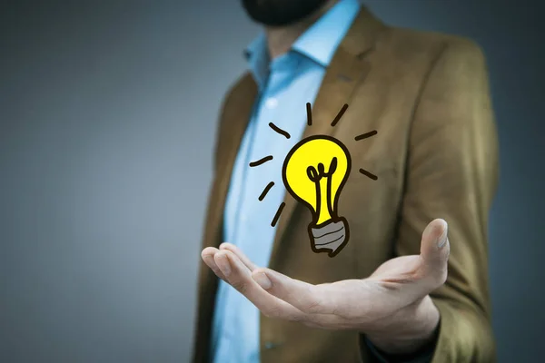 idea concept. Hand of business man  light bulb