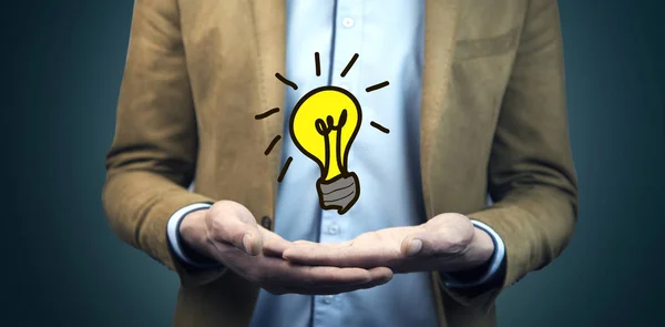 idea concept. Hands of business man  light bulb