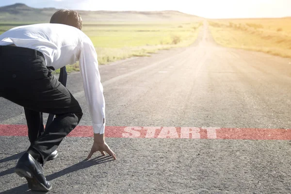 Businessman ready to start on the road