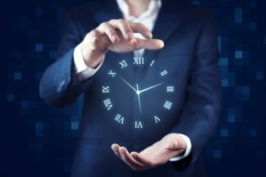 saat simgesi ile genç işadamı 